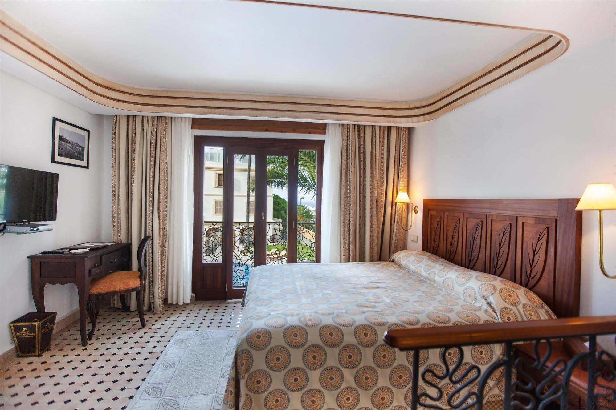 Grand Hotel Villa De France Tanger Exterior foto A bedroom at the hotel